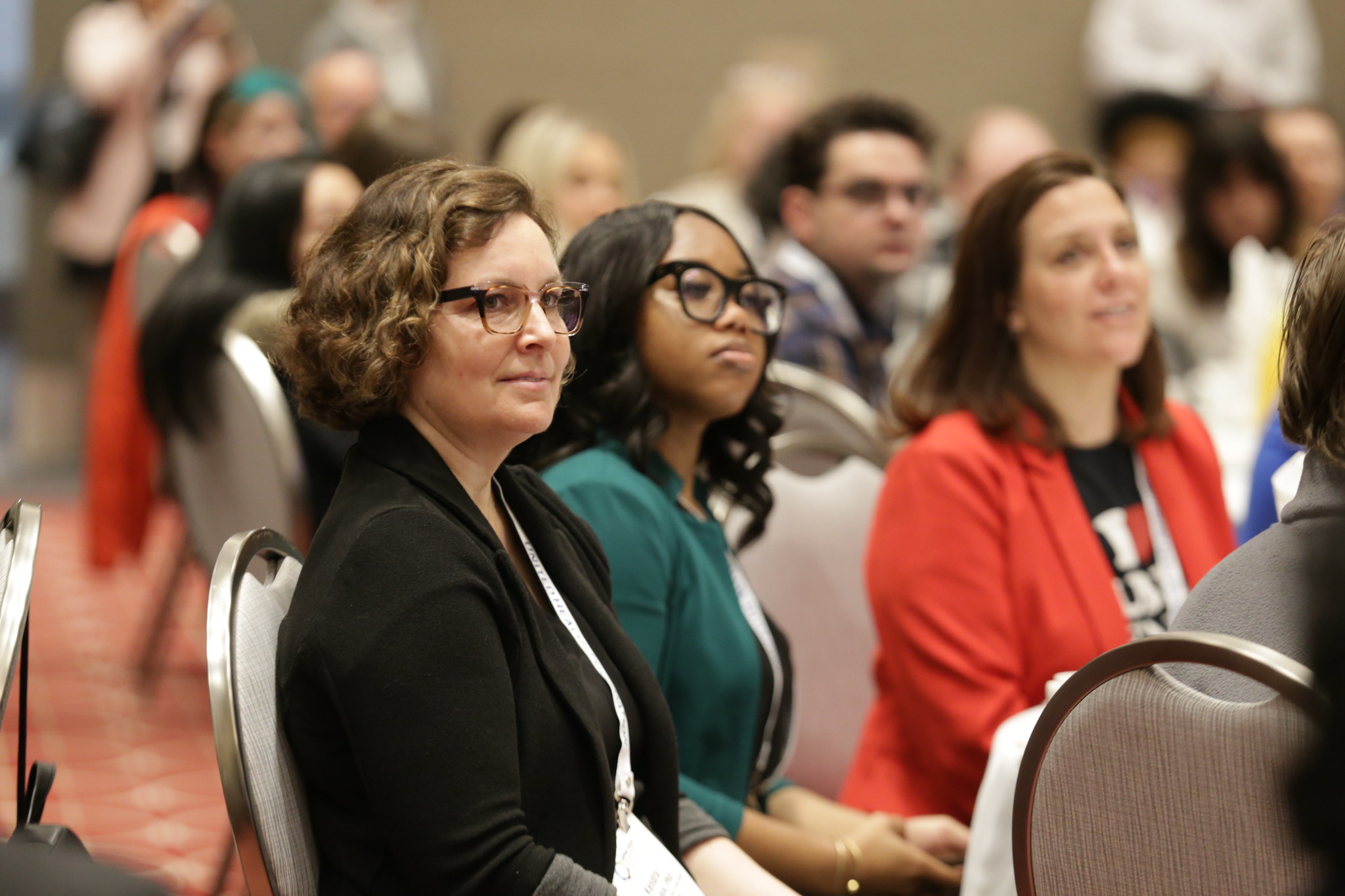 APHA 2024 conference photo of two people sitting at a table